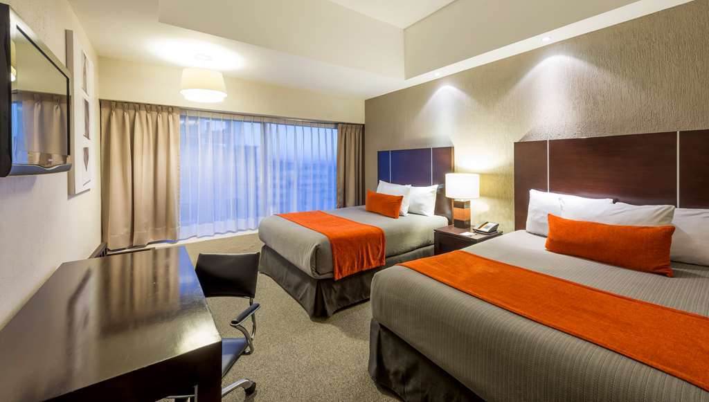 Hotel Plaza Genova Centro Гвадалахара Номер фото